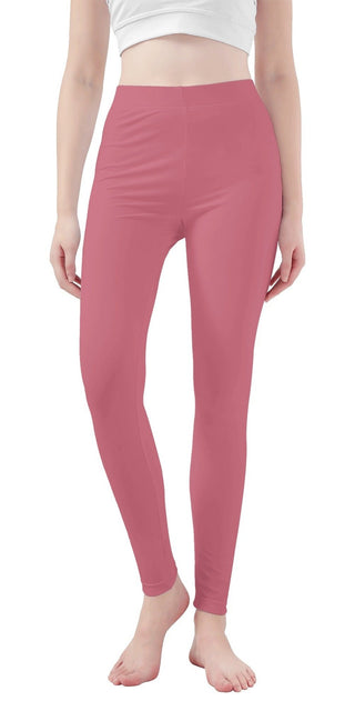 Stylish pink women's leggings with a high-waisted design, providing a flattering fit and comfort for active lifestyles.