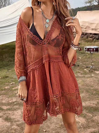 Boho lace and fringe detail dress on female model in outdoor bohemian setting