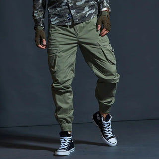 High-quality khaki tactical cargo pants with multiple pockets, camouflage design, and fashionable black army-inspired trousers from the K-AROLE apparel brand.