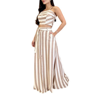 Stylish striped print skirt and top set, showcasing a trendy, summery outfit with a crop top and maxi skirt in neutral tones.