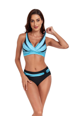 Stylish halter swimsuit featuring a vibrant blue color and sleek design, showcasing the model's fit figure and beach-ready look.