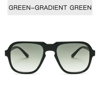 Stylish vintage-inspired black sunglasses with large rims and a green-gradient lens effect, showcasing a trendy and fashionable accessory.