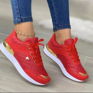 Trendy women's red sneakers with love decor, lace-up design, and white soles. Stylish patchwork accents and gold metallic details add a touch of fashion to these comfortable, casual shoes.