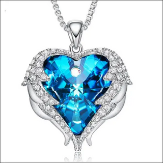 Elegant Crystal Heart Pendant Necklace
Dazzling Crystal-Studded Heart Pendant on Silver Chain K-AROLE