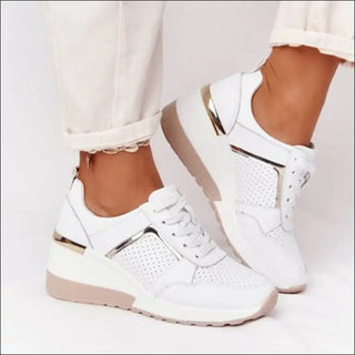 Stylish Casual Kicks: Sleek White Leather Sneakers with Perforated Details