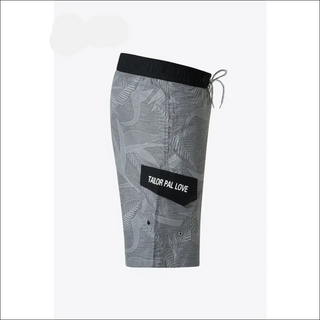 Gray and white patterned athletic shorts with a black drawstring and "TAILOR PAL LOVE" text on a black patch.