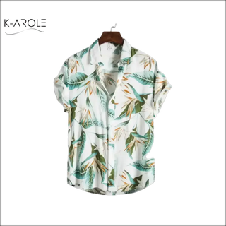 Tropical print curved hem shirt featuring vibrant leaf patterns and a relaxed, comfortable fit from K-AROLE's women's athleisure collection.