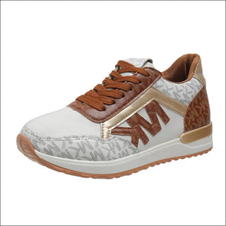 Stylish brown and beige sneakers with a round toe, lace-up closure, and a thick, textured sole. The sneakers feature a modern, sporty design with a geometric patterned upper and contrasting leather details. The sneakers appear comfortable and suitable for casual or athletic wear.