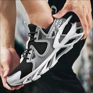 Modern black and white athletic sneakers with sleek design and chunky midsole for active lifestyle.