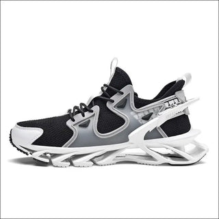 Sleek and sporty men's trainer sneakers in black and grey colorway. The sneakers feature a breathable mesh upper, robust sole unit, and bold contrasting design elements for a modern, athletic aesthetic. These versatile, performance-oriented shoes are well-suited for active lifestyles and various athletic pursuits.