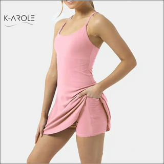 Woman's pink pocketed tennis yoga running dress from K-AROLE fashion brand