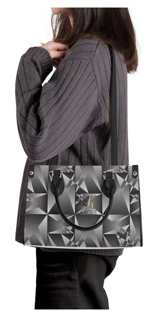 Stylish K-AROLE™️ geometric print tote bag with sleek grey design, featuring a modern pattern and practical handheld design for women's fashion.