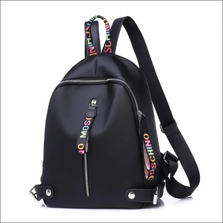 Fashionable and functional K-AROLE backpack with vibrant straps, multiple zippered compartments, and a sleek black design to elevate your style.