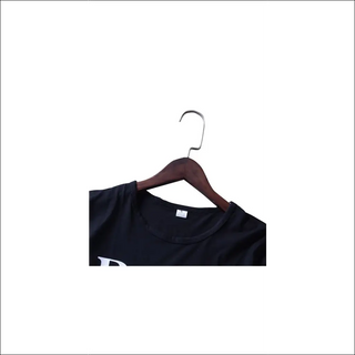 Stylish navy blue t-shirt with a subtle printed design, displayed on a wooden hanger against a plain white background.