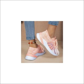 Stylish pink and white sports shoes with lace-up design, breathable mesh material, and patterned accents. Casual sneakers suitable for running, walking, and everyday wear.