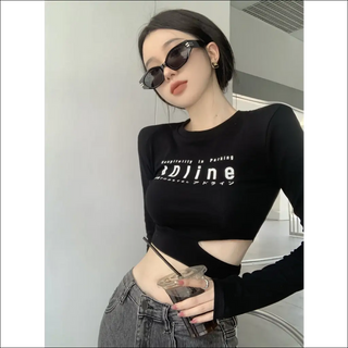 Sleek black crop top with "Dline" text graphic, young woman wearing sunglasses and holding a cup, minimalist background.