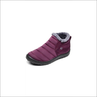 Plush winter ankle boots for women in vibrant purple, featuring a cozy faux fur lining and a durable, non-slip sole for comfortable warmth and traction.