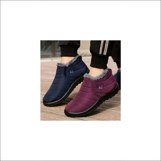 Cozy women's winter boots in navy blue and burgundy, featuring warm lining and anti-slip soles for comfortable walking on snowy terrain.