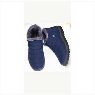 Cozy navy blue winter boots with plush gray lining for women, suitable for cold weather from K-AROLE.