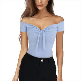 Off-shoulder blue top with front tie detail, worn by a young woman with long dark hair.