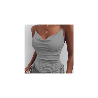 Sleek and stylish gray spaghetti strap top with a low V-neck, featuring a delicate pendant necklace that complements the minimalist design.