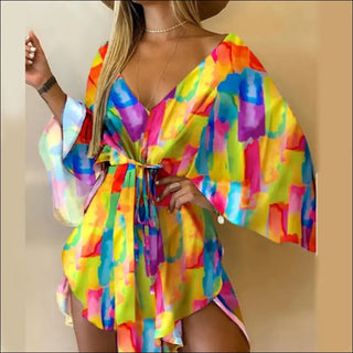 Vibrant Floral Delight: K-AROLE™ Wrap Front Romper