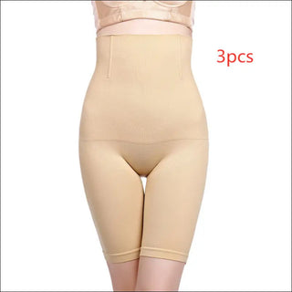 High-waist shaping undergarment with tummy control and body sculpting. Versatile beige design to seamlessly complement your outfit.