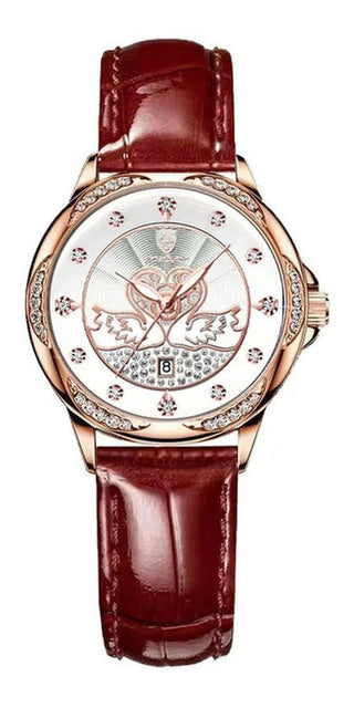 Rose gold women's luxury watch with a leather strap and a diamond-studded face, featuring a floral motif. The watch is displayed on a plain background.
