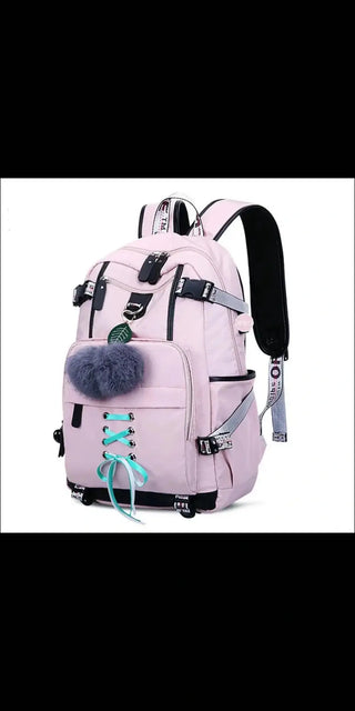 Stylish women's backpack with external USB charging port and plush fur accent. Versatile design in trendy pastel pink color. Ideal for everyday use or travel.